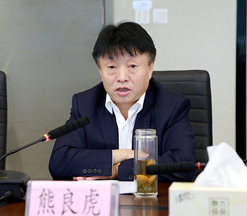 熊良虎会见陕西地电（集团）公司党委书记、董事长邹满绪